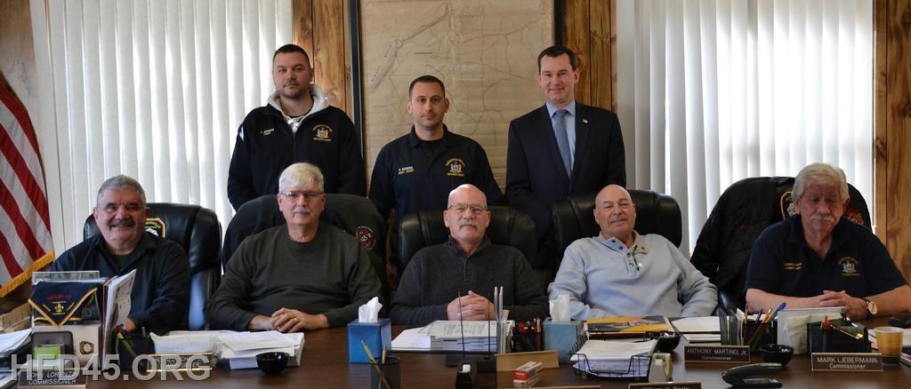 Back Row:
1st Assistant Chief Justin Jerrick, Chief of Department Paul Rogers, District Duty Captain William Beale 

Front Row Fire Commissioners: 
Vincent Galvin, Michael Schappert, John Lorenzini, Anthony Martino, Mark Liebermann
