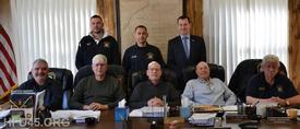 Back Row:
1st Assistant Chief Justin Jerrick, Chief of Department Paul Rogers, District Duty Captain William Beale 

Front Row Fire Commissioners: 
Vincent Galvin, Michael Schappert, John Lorenzini, Anthony Martino, Mark Liebermann
